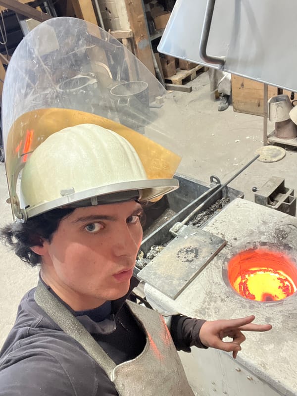 Furnace operator works with molten materials in Saint-Rémy-lès-Chevreuse