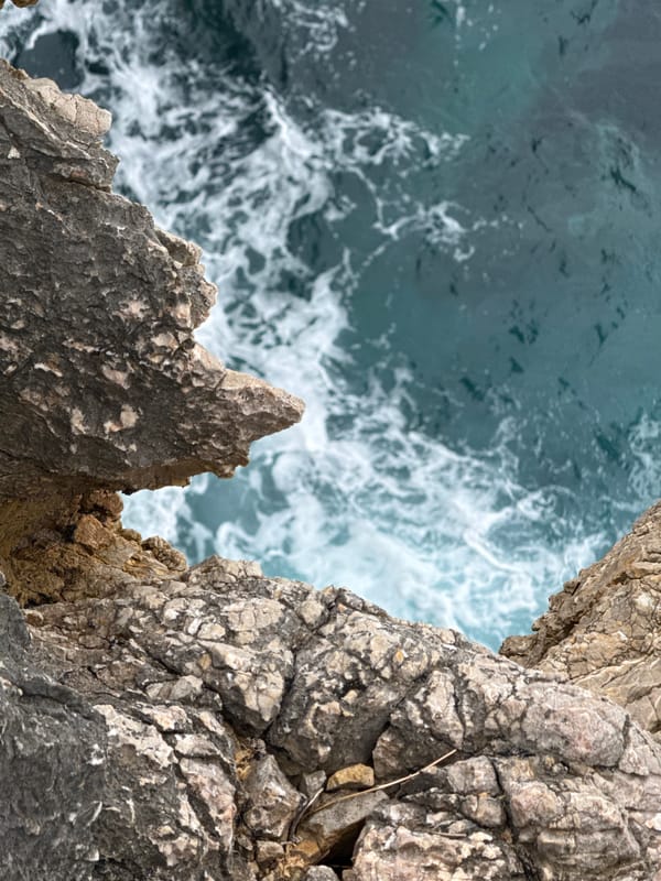 Rugged cliffs and sea caves along the Llanes coastline