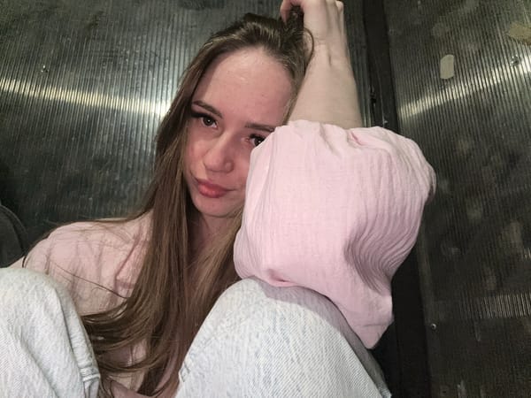 Young women photograph casual selfie session with playful orientations