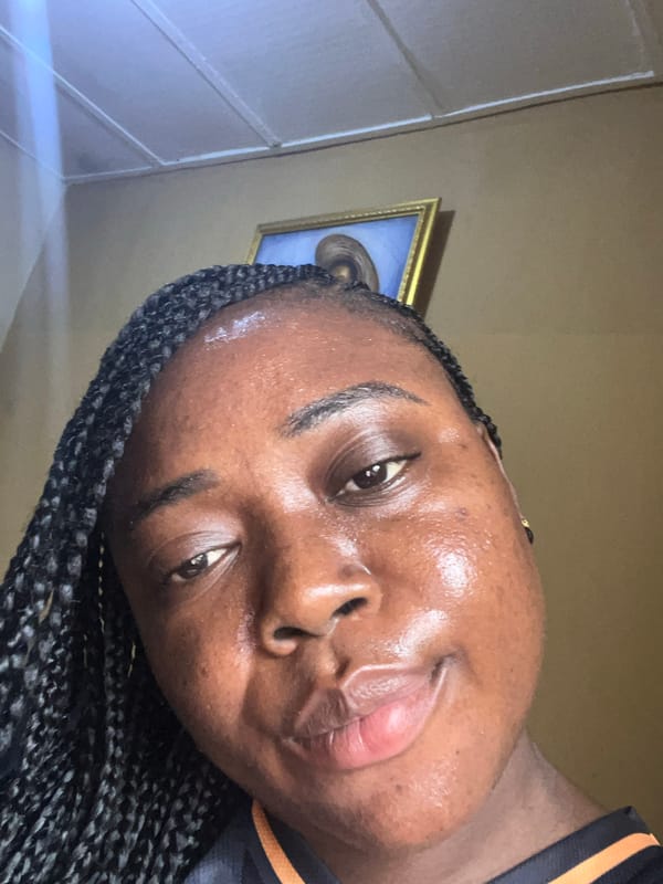 Woman takes morning selfies at home in Madalla, Nigeria