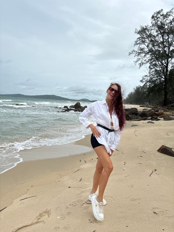 Beach day selfies and surroundings under a cloudy sky