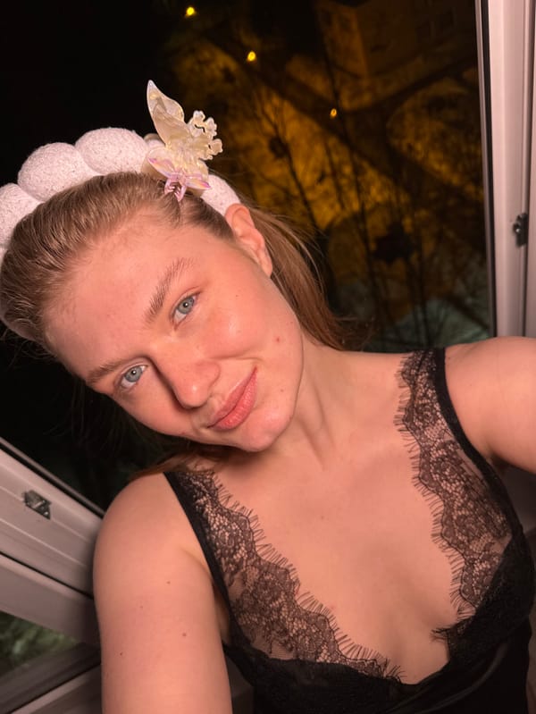 Woman documents evening selfie session in Kazan apartment