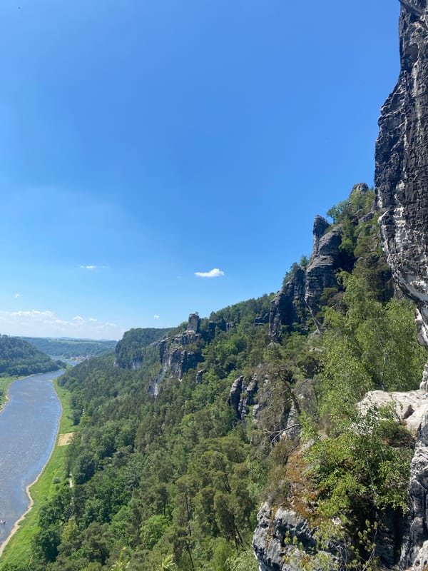 Tourist photographs Bastei rock formation views in Lohmen, Germany