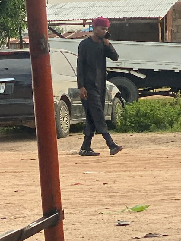 Mechanic repairs cars at roadside workshop in Jalingo