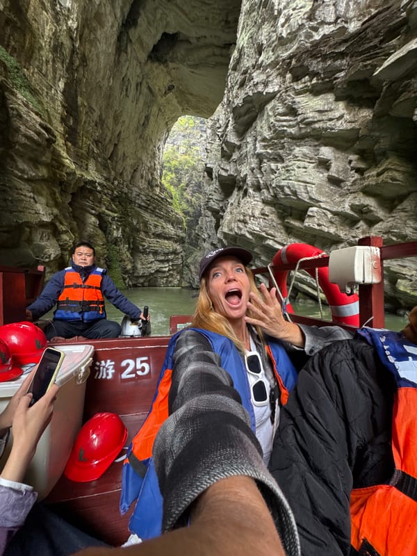 Tourists express awe during gorge boat tour in China