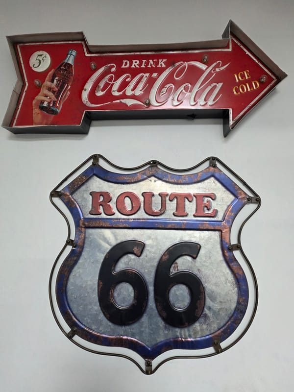 Vintage advertising signs spotted on Nicosia wall