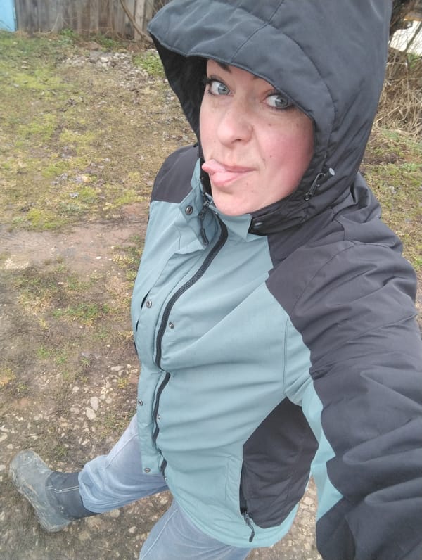 Woman takes outdoor selfie in Grishanki, Russia