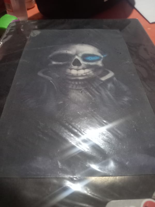 Mysterious skull artwork with glowing blue eye spotted in Trujillo