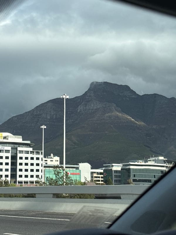 Cloudy Table Mountain photographed from vehicle in Cape Town