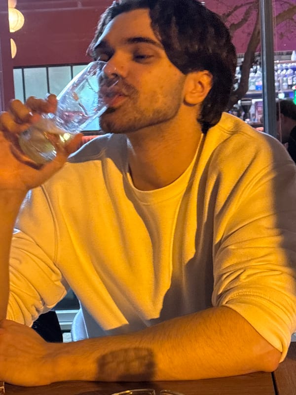 Young adults gather at outdoor cafe in Vila Real