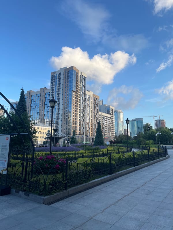 Urban park stroll with gardens, architecture, and coffee break