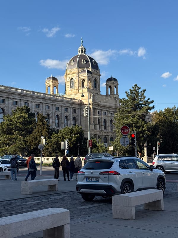 Afternoon street activity documented around Vienna's Kunsthistorisches Museum