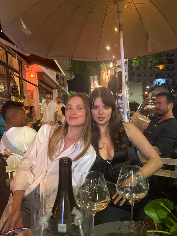 Evening social gathering captured at Tel-Aviv restaurant patio