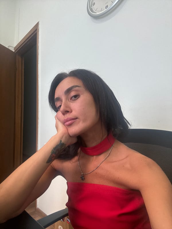 Selfie session at a Tbilisi desk and balcony