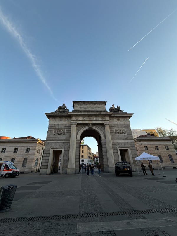 Tourist documents Milan architectural landmarks during afternoon walking tour