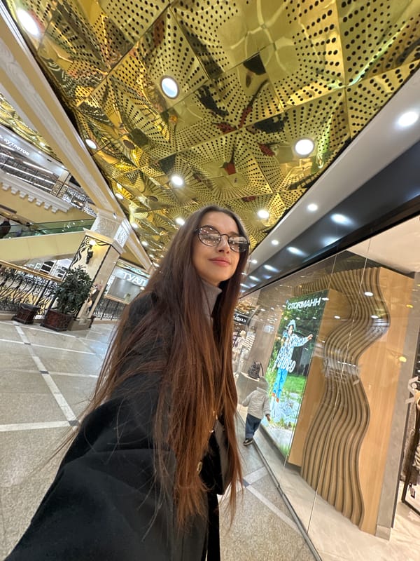 Mother and child explore Yekaterinburg shopping mall during morning visit