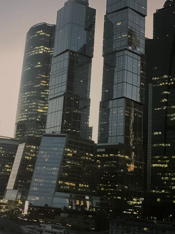 Moscow City skyscrapers glow after dark