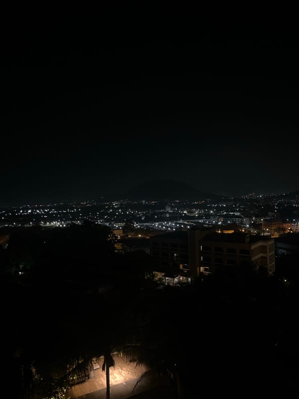 DJ setup and city lights after dark in Ratsada
