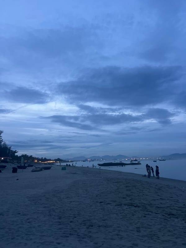 Hoi An beach at dusk: bonfires, empty sands, abandoned resort