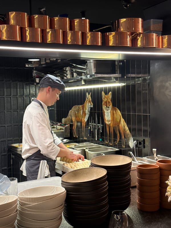 Inside a characterful Moscow bar with food, drinks, and folk decor