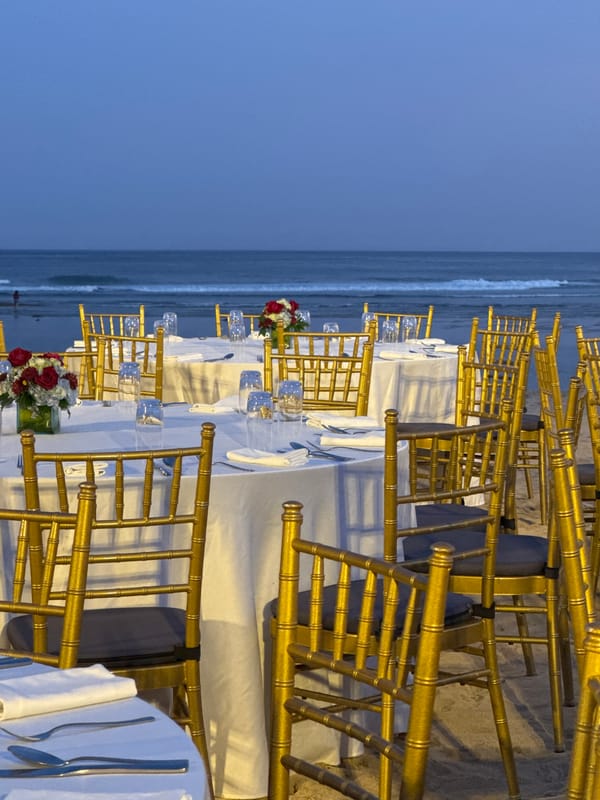 Beach wedding reception setup captured in Kuta Selatan, Indonesia