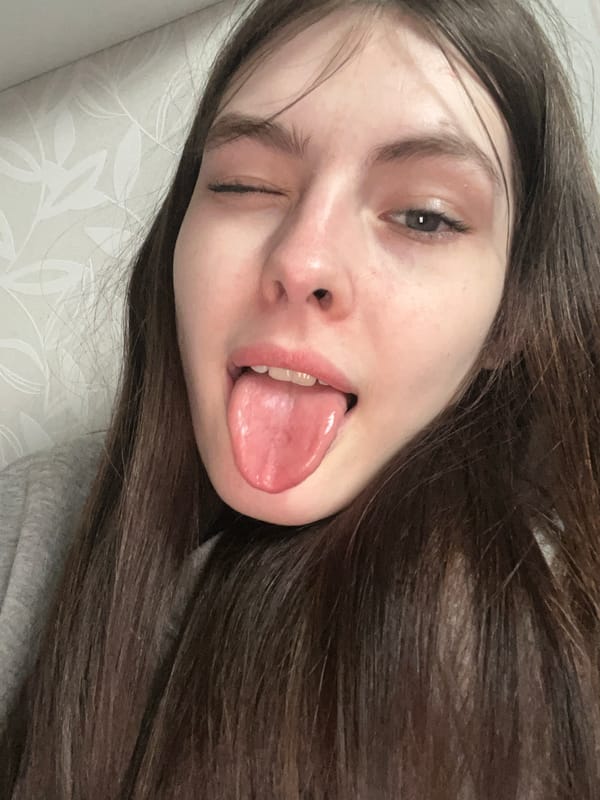 Woman Takes Selfies Indoors in Saint Petersburg