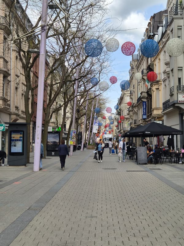 Daytime street life documented in Esch-sur-Alzette commercial district