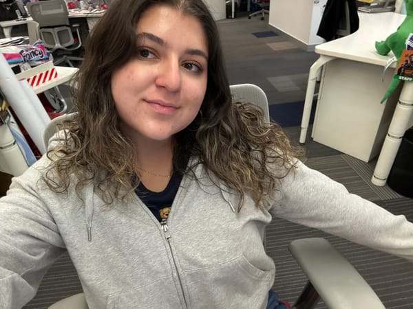 Woman takes selfie in Mexico City evening