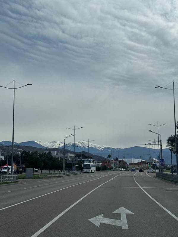 Road with mountain backdrop documented in Sirius, Russia