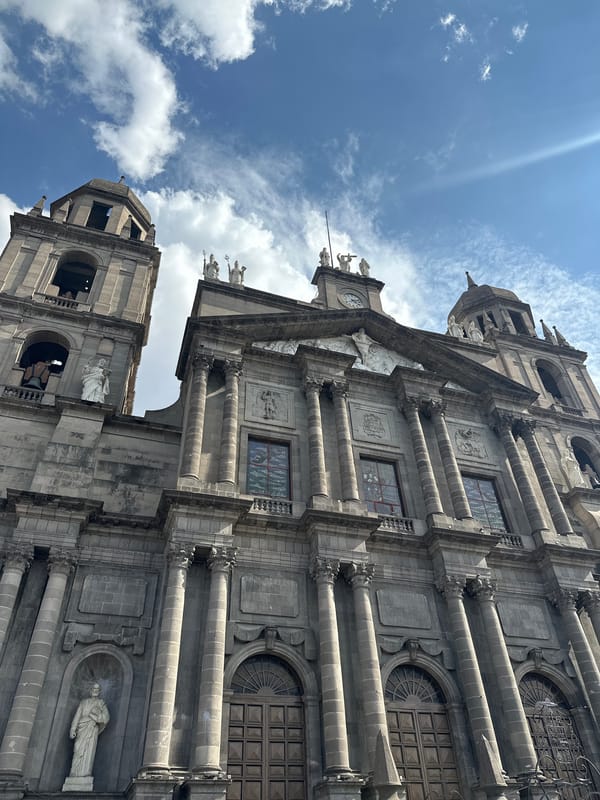 Visitor photographs Toluca Cathedral exterior and interior dome details