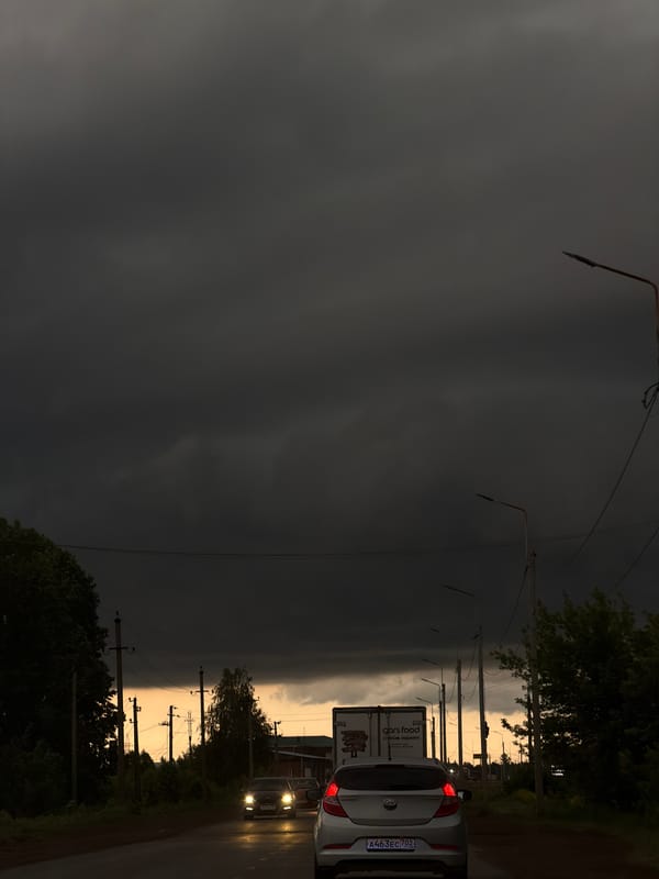 Dark storm cloud looms over Neftekamsk street scene