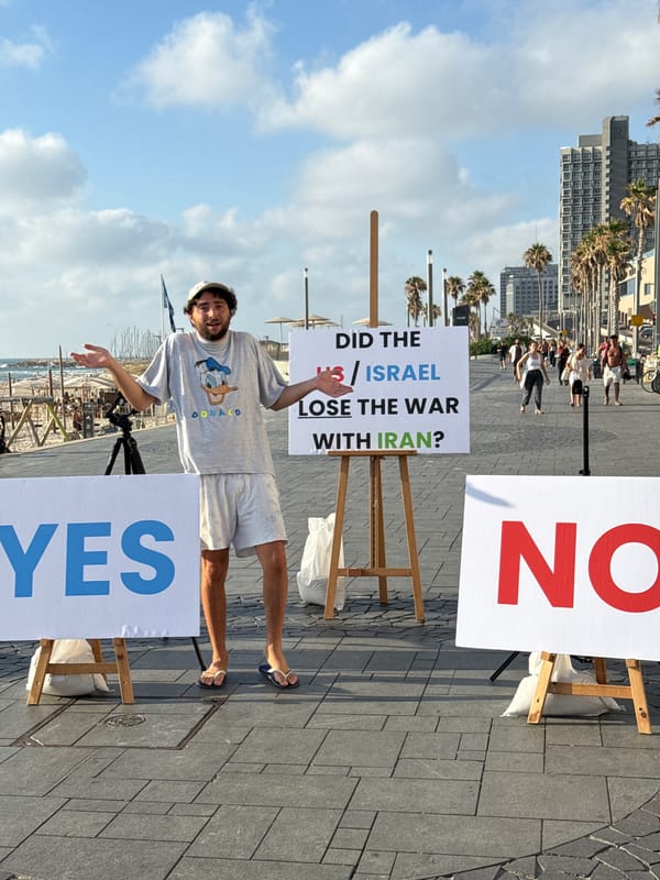 A busy Tel Aviv afternoon — protests, cafés, and construction