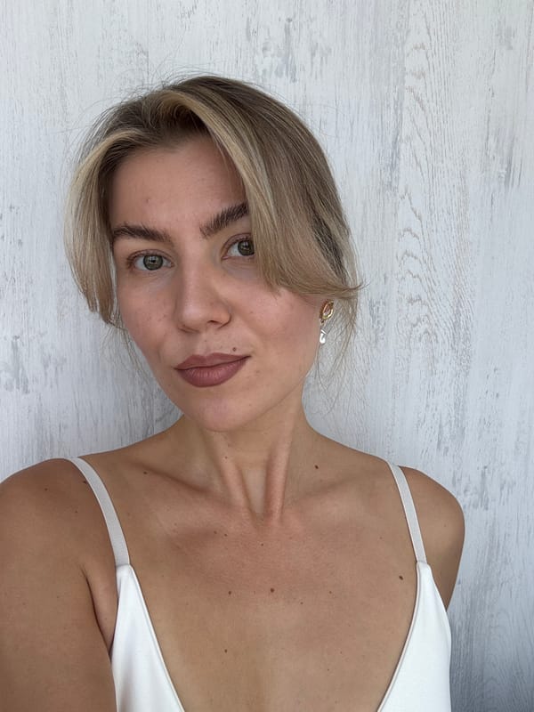 Blonde woman photographed in close-up at unknown location