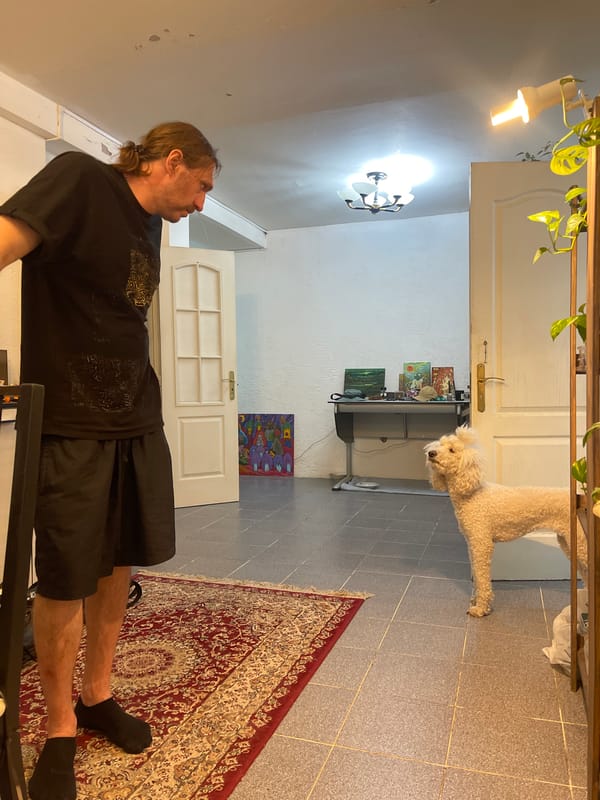 Surrealist paintings and a poodle in a Krasnoyarsk studio