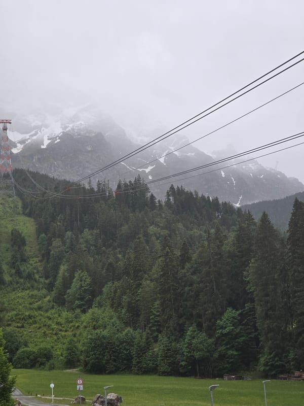 Early morning mountain views captured in misty Grainau, Germany