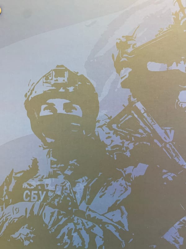 Office space snapshot with decorative objects and military print materials