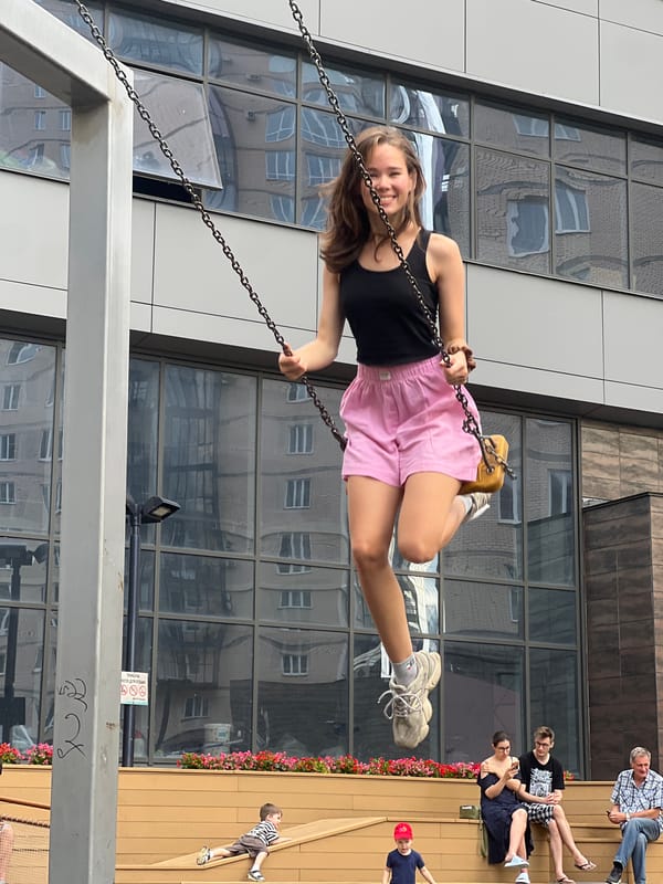 Swinging in an urban spot in Krasnoyarsk on a summer day