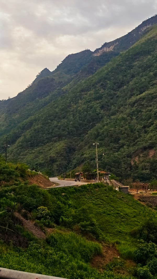 Overcast morning captures winding mountain road in northern Vietnam