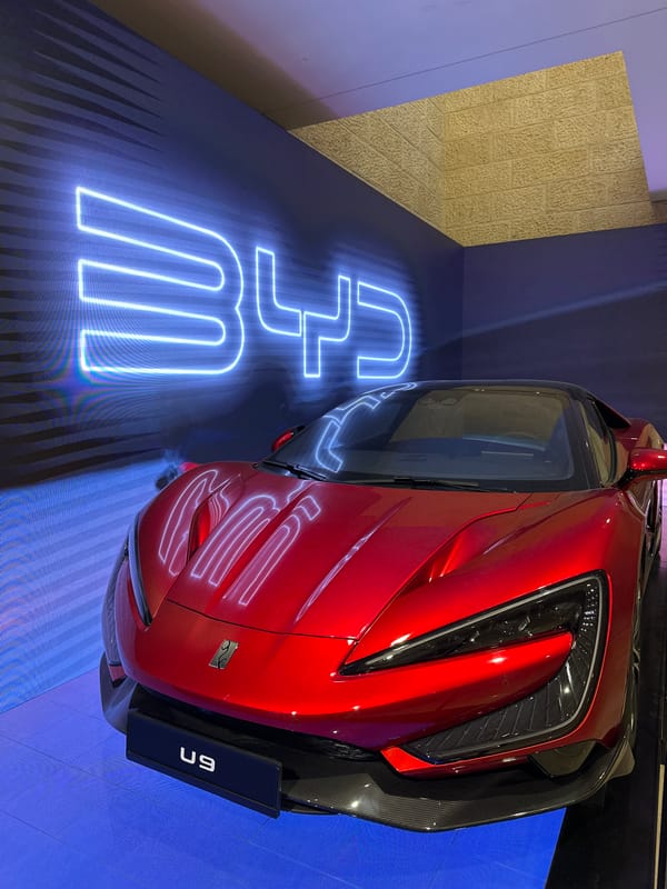 Red sports car on display in Tel Aviv showroom