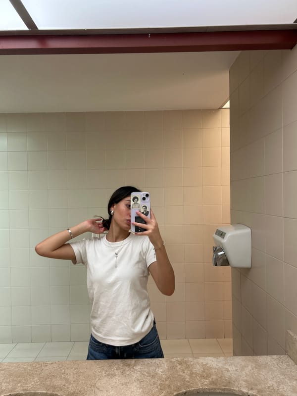 Person Takes Restroom Selfie Near Coffee Shop Area
