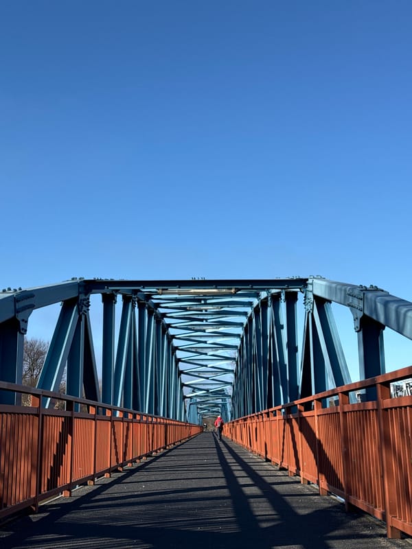 Bridge photography session captures Carnikava railway crossing from multiple angles