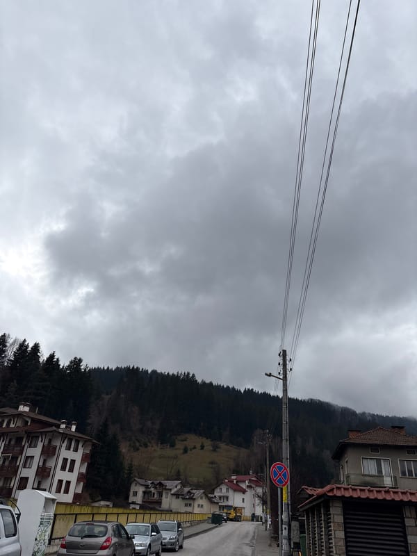 Cloudy day residential street scene in Chepelare, Bulgaria