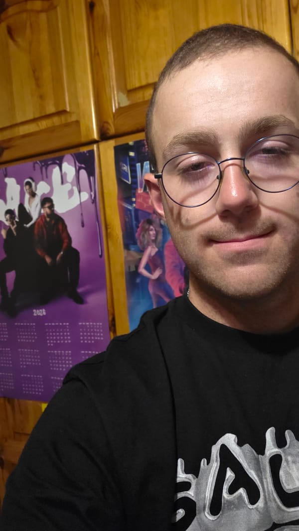 Close-up portraits with wire-rimmed glasses and a graphic tee.