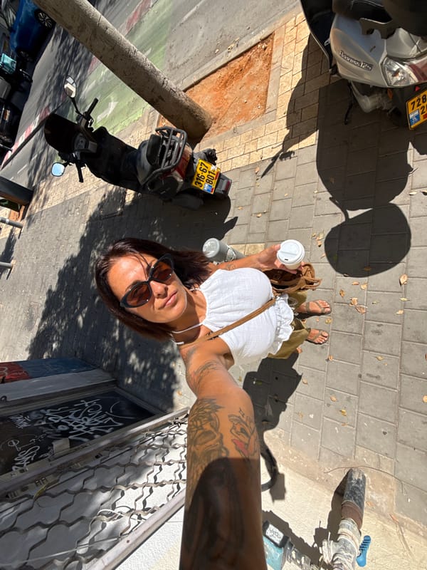 Morning coffee stop on a Tel Aviv sidewalk