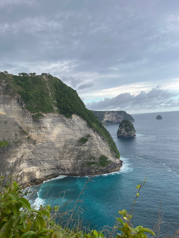Dramatic coastal landscape photographed from Nusa Penida vantage point