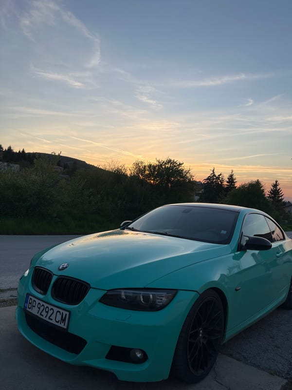 Turquoise BMW spotted during sunset in rural Bulgaria