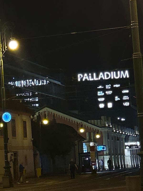 Nighttime stroll through illuminated Prague city center documented