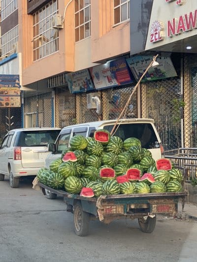 Daily street commerce continues in Kandahar's busy districts