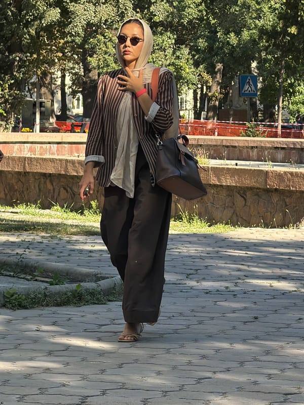Strolling through a park path, two different outfits