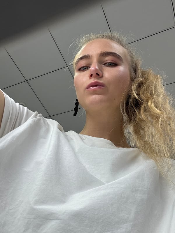 Woman documents nail salon visit with selfies and manicure